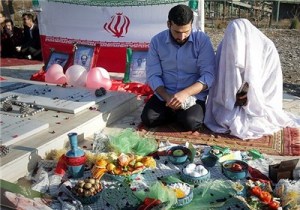 ازدواج زوج جوان آستارایی در کنار مزار شهدای گمنام