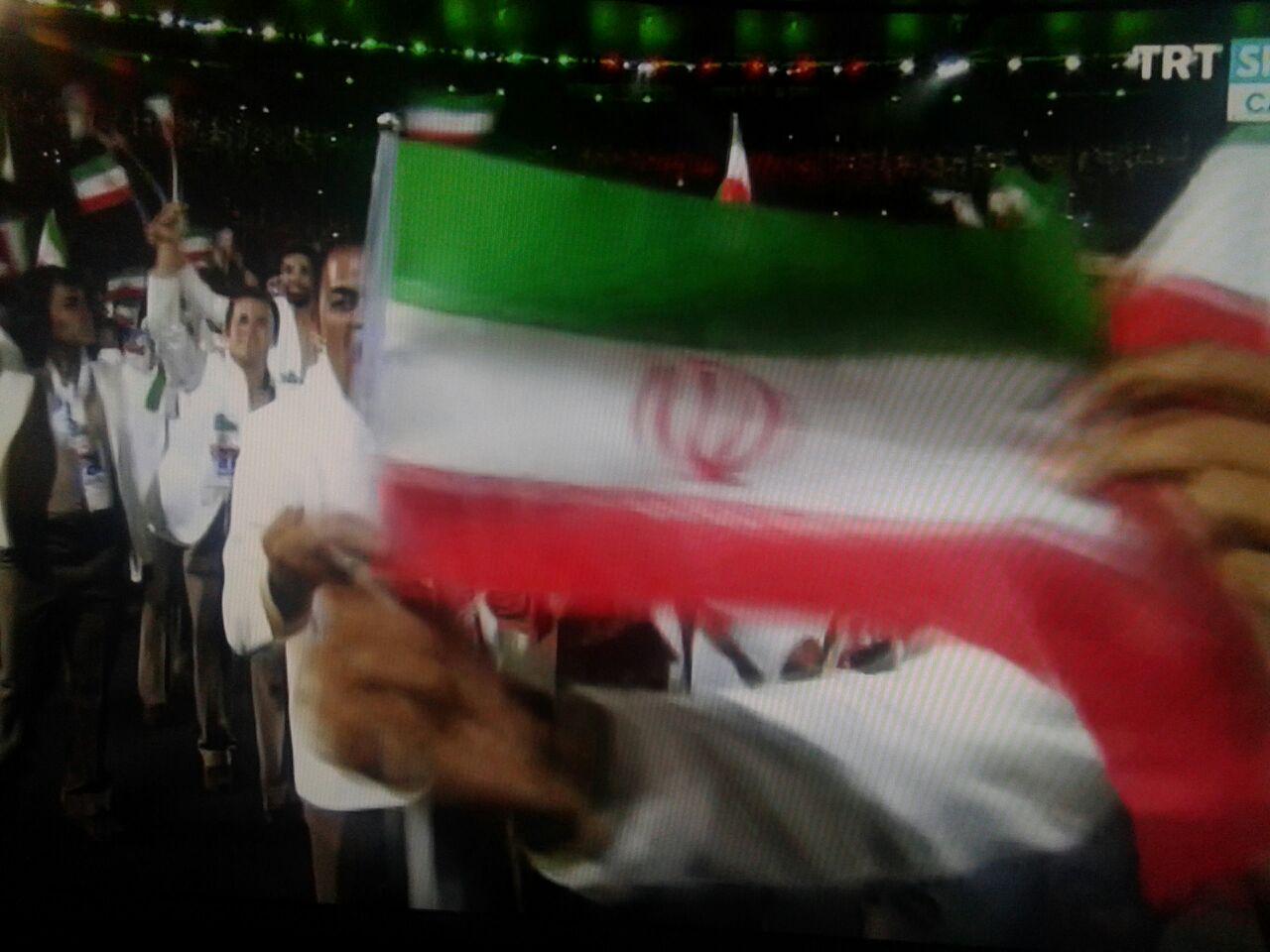 رژه کاروان ایران در مراسم افتتاحیه/ بانوی پرچمدار ایران با لباس احرام + عکس