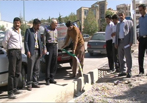 سفید کردن آسفالت جلوی استانداری با شیر