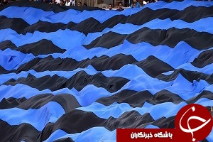 باز شدن پرچم بزرگ در سکوهای استقلال + فیلم