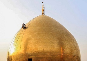 غبارروبی گنبد حرم امامین عسکریین(ع) در سامرا + تصاویر