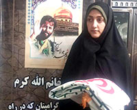 پرچم کاروان پارالمپیک از سوی همسر مدافع حرم به پرچمدار ایران اهدا شد