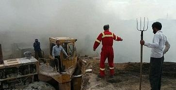 مهار آتش انبار گندم و جو در تکاب