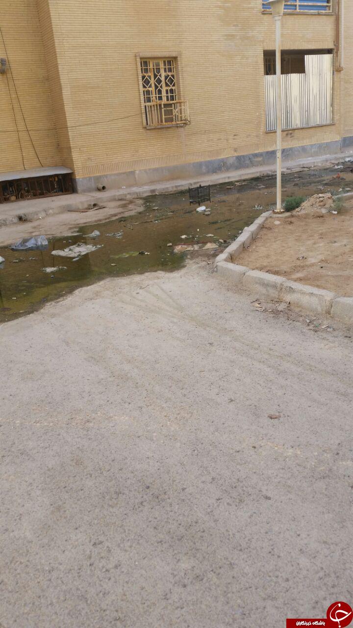 مشکل فاضلاب در مجتمع 48 واحدی هندیجان + تصاویر
