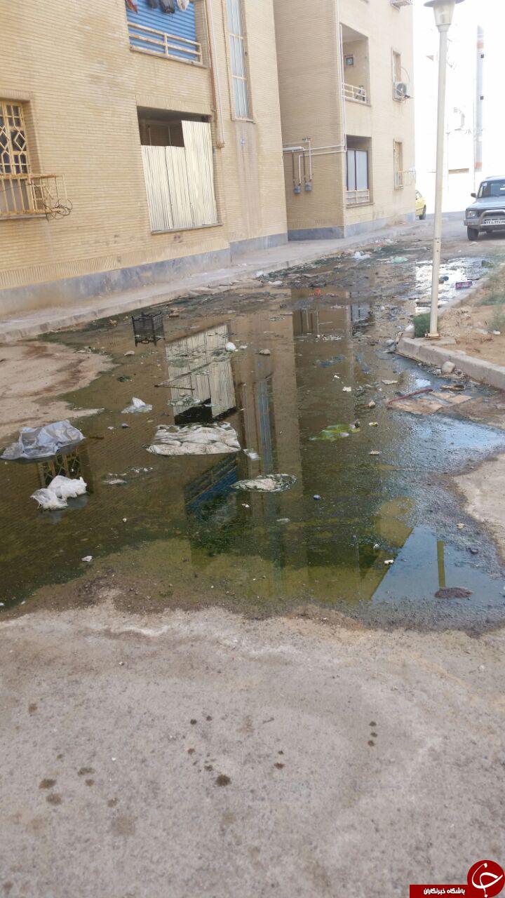 مشکل فاضلاب در مجتمع 48 واحدی هندیجان + تصاویر