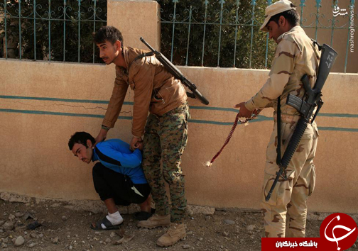 عکس/ لحظه بازداشت یک داعشی در موصل