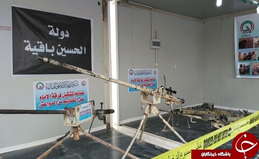 حشدالشعبی غنایم جنگی از داعش را در مسیر در راهپیمایی اربعین به نمایش گذاشت+ تصویر
