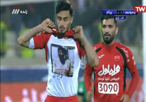 ادای احترام به شهید مدافع حرم