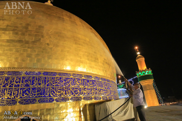 شستشوی گنبد حرم مطهر امام علی(ع) +تصاویر