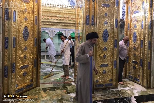 شستشوی گنبد حرم مطهر امام علی(ع) +تصاویر