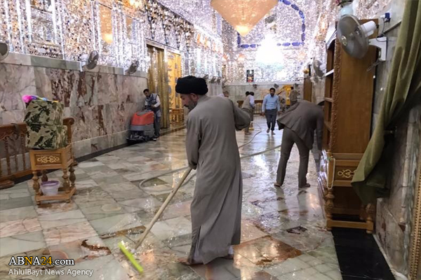 شستشوی گنبد حرم مطهر امام علی(ع) +تصاویر