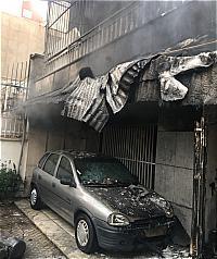 نجات زوج سالخورده از میان دود و آتش در خیابان مطهری