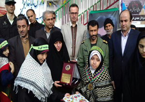 اهدای مدال طلای موی تای کار آملی به خانواده شهید مدافع حرم