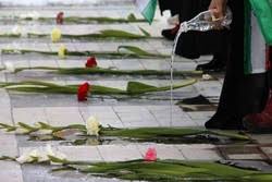 غبار روبی مزار شهداء در دهه مبارك فجر