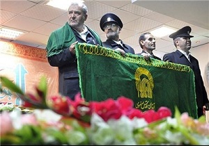 رونمایی از بیرق اهدایی آستان قدس رضوی در بیمارستان طالقانی کرمانشاه