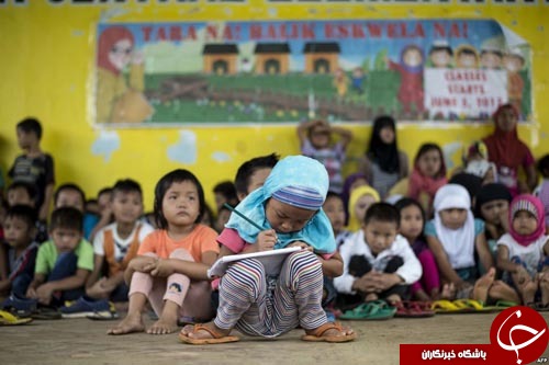 تصاویر روز: از ارسال عظیم&zwnj;ترین ماهواره هند به فضا تا ورزش دادن چشم در مدارس چین