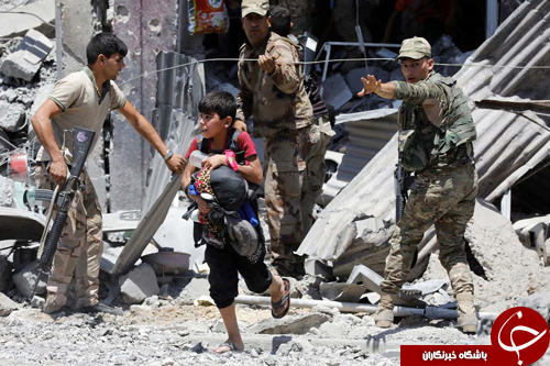 تصاویر روز: از حادثه تروریستی در تهران تا گردهم&zwnj;آیی مردان عنکبوتی در سنگاپور