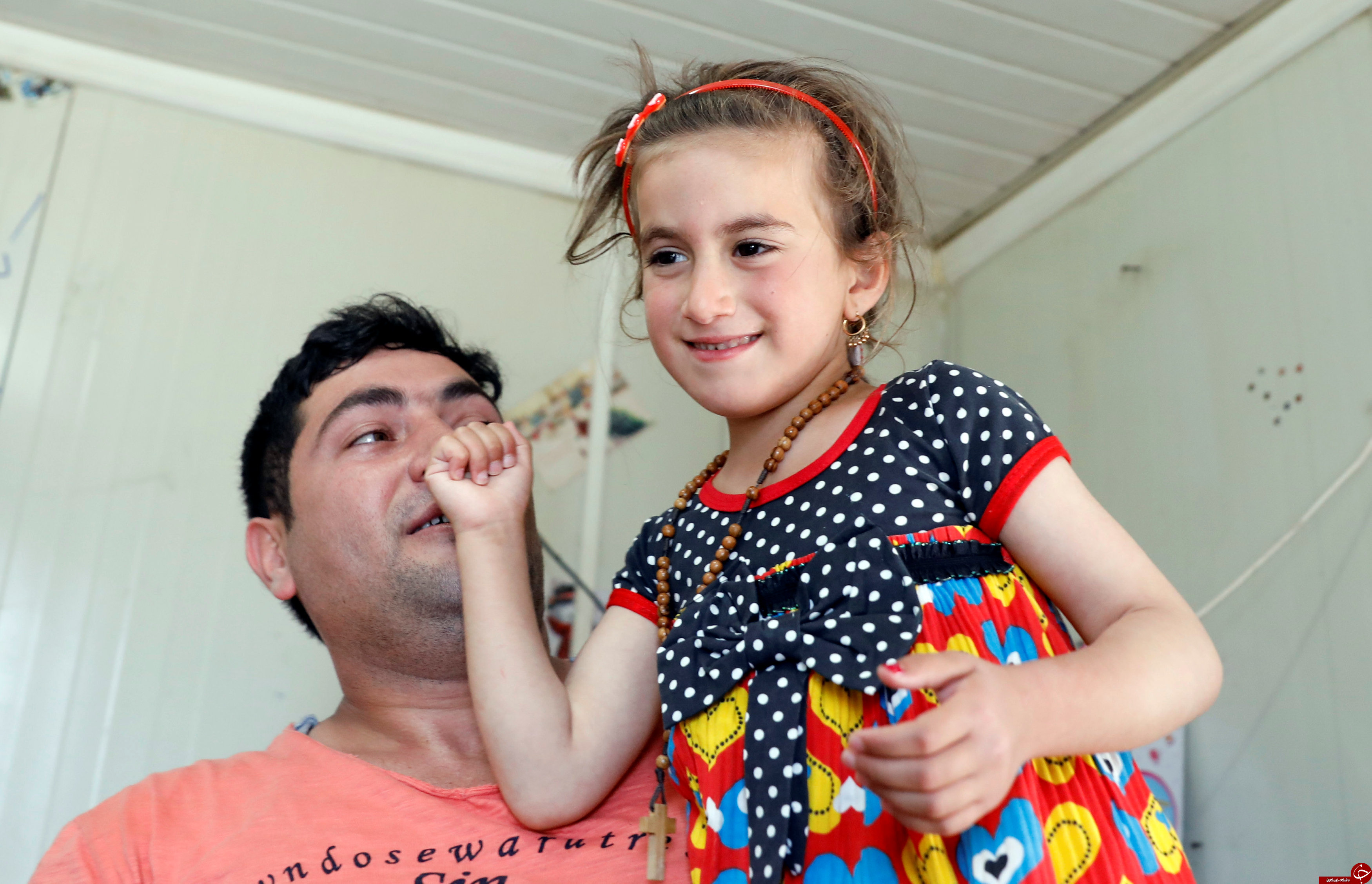 پیوستن کودک ربوده شده بدست داعش، به خانواده&zwnj;اش پس از 3 سال+ تصاویر