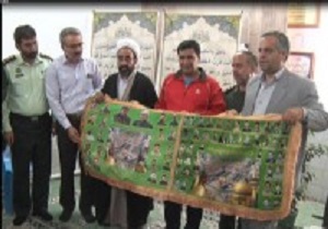 دوچرخه سوار حامل پرچم متبرک کربلا و شهدای دفاع مقدس درمیبد