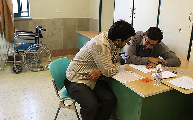 حضور داوطلبان کمتوان جسمی در کنکور سراسری96+تصاویر حضور داوطلبان کمتوان جسمی در کنکور سراسری96+تصاویر
