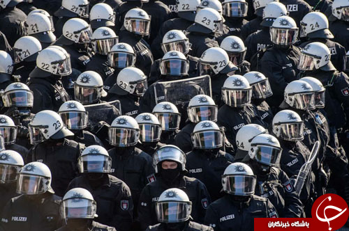 تصاویر روز: از جنازه&zwnj;های تازه کشف شده دوران کشتار جمعی در صربستان تا استفاده از ماشین آب&zwnj;پاش در تظاهرات هامبورگ
