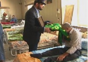 عیادت خادمان حرم حضرت فاطمه معصومه  از جانبازان