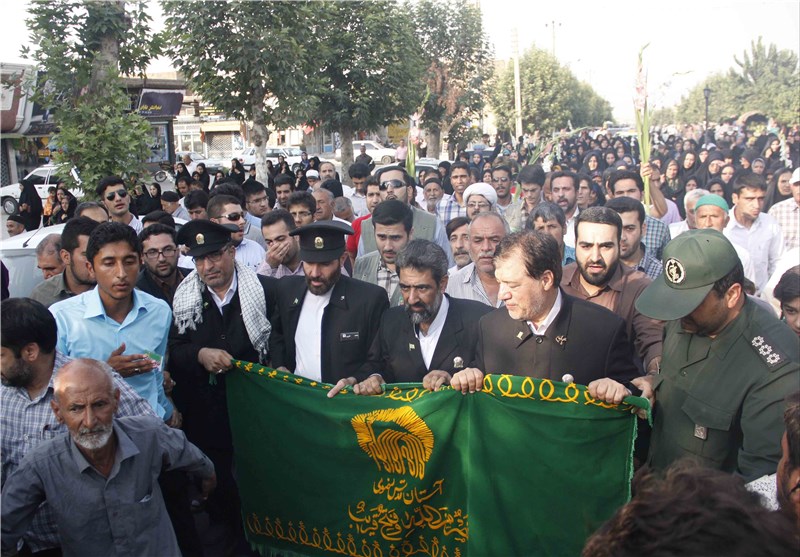 میزبان ۲ شهید گمنام، خادمان و پرچم متبرک امام رضا (ع) است