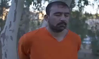 اعدام هولناک یک زندانی توسط داعش+فیلم