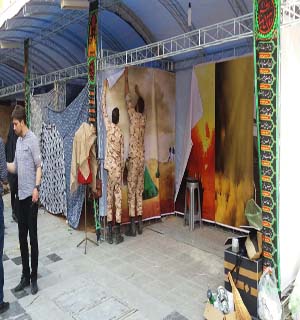 نمایی از آماده سازی نمایشگاه دفاع مقدس + تصاویر