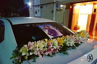 ماشین‌عروس مزین به عکس شهید حججی+عکس