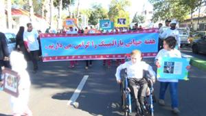 گرامیداشت روز ملی پارالمپیک با راهپیمایی معلولان در رشت