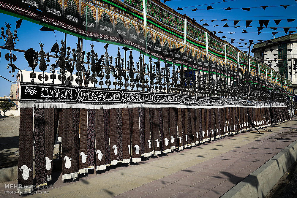 از خود نمایی تا عَلَم کِشی در ماه محرم/ حکم عَلَم کِشی در مراسم عزاداری چیست؟
