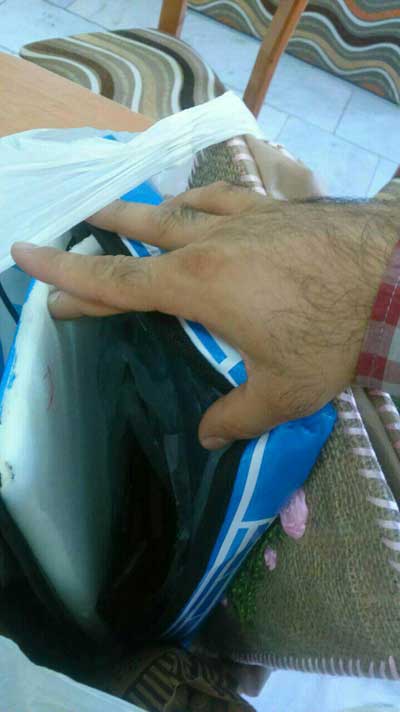 کشف تریاک از داخل بادام زمینی و کیف صنایع دستی +عکس