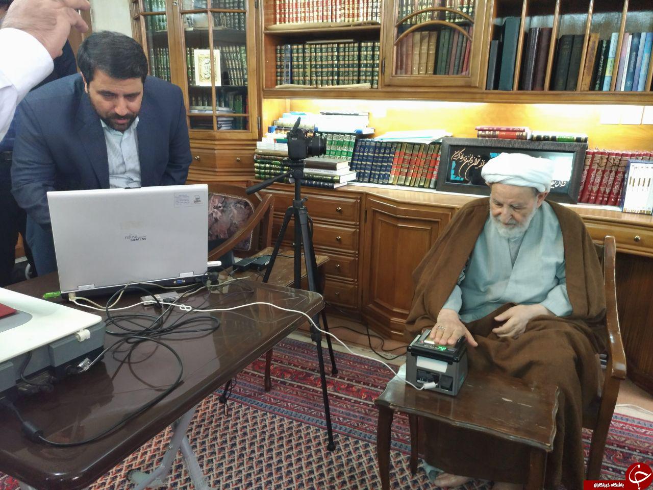 ایستگاه سیار ثبت نام کارت ملی هوشمند در منزل علما+تصویر