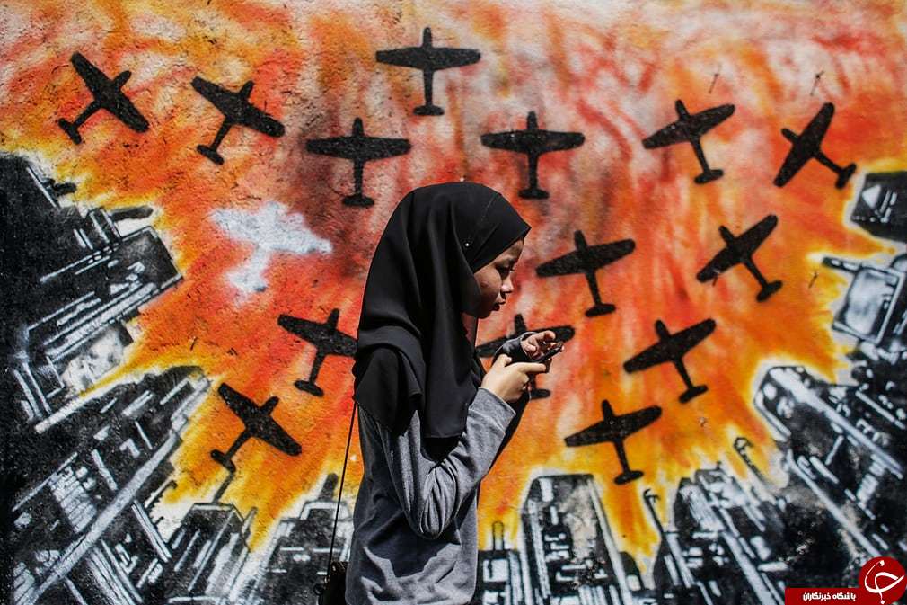 تصاویر روز: از آتش&zwnj;سوزی جنگل&zwnj;های کالیفرنیا تا پرواز قوها بر فراز دریاچه قو در چین