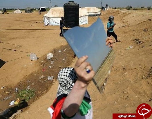 راهکار جالب فلسطینی&zwnj;ها برای فرار از دست تک تیراندازهای اسرائیلی +عکس