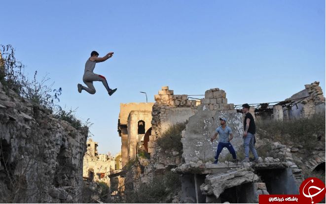 تصاویر روز: از برگزاری جنگ بالش&zwnj;ها در نیویورک تا تمرین پارکور در حلب