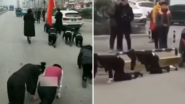 چهار دست و پا راه بردن کارمندان زن در خیابان! + فیلم//