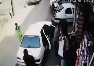 زیر گرفتن یک آقا و خانم با پژو پارس در اثر استارت زدن کودک بازیگوش + فیلم