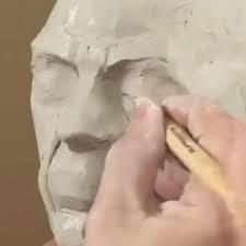 نابینایی که از خاک رس مجسمه می سازد+ عکس