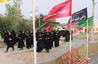 بازدید کاروان راهیان نور از یادمان شهدا در مهاباد