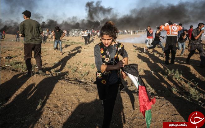 تصاویر روز: از پرتاب گاز اشک آور به سوی معترضان فلسطینی تا شکسته شدن طلسم موج گرما در پاریس