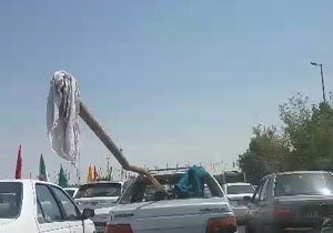 حمل بار خطرآسای پژو در وکیل‌آباد + فیلم