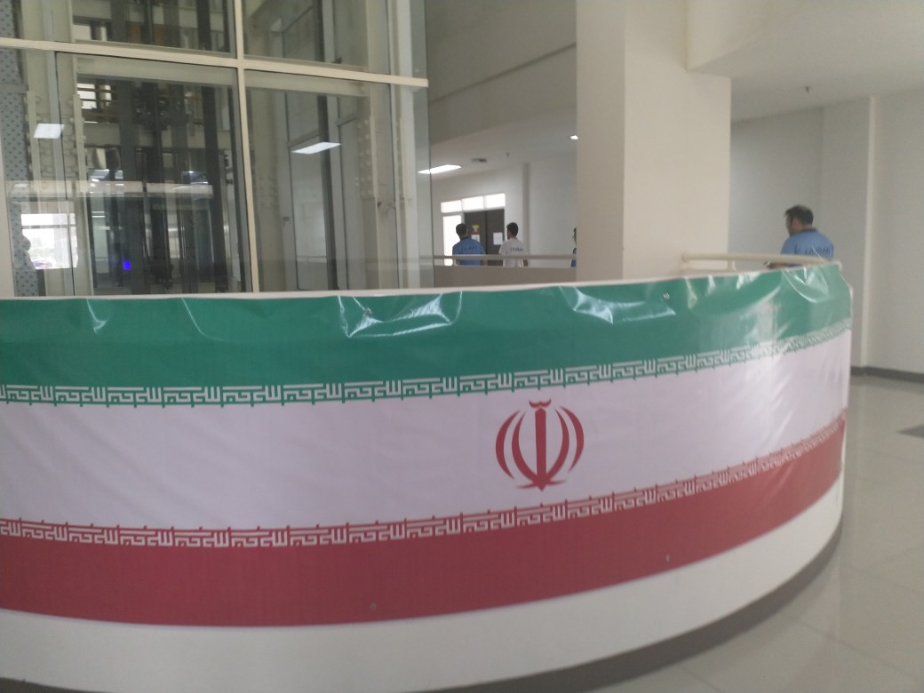 پرچم ایران در دهکده مسابقات به اهتزاز درآمد
