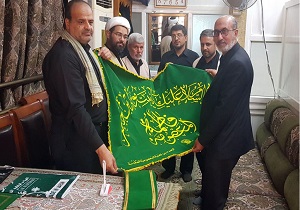 پرچم متبرک حرم حضرت معصومه(س) به عتبه علوی اهداشد