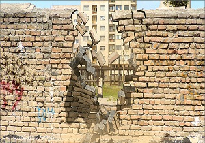 تخریب دیوار ۲ منزل مسکونی در منبع آب اهواز بر اثر بارندگی