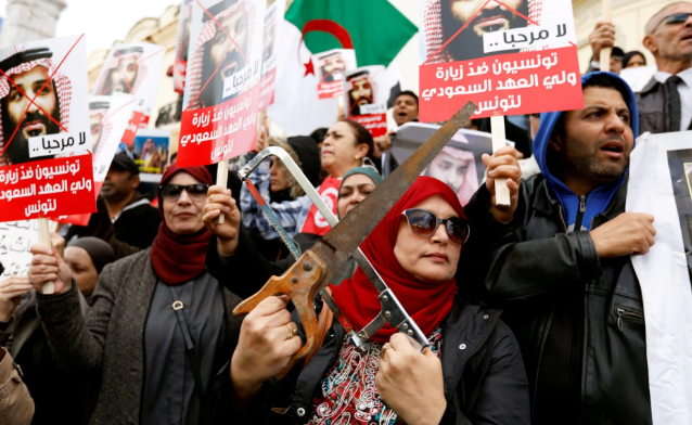 تصاویر روز: از اعتراض به سفر بن سلمان در تونس تا استراحت کودک مهاجر بر روی یک سرسره در مکزیک