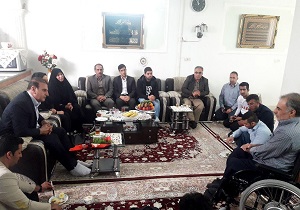 دیدار قهرمانان با جانباز قطع نخاعی