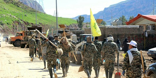 گزارشی از فعالیت روزانه رزمندگان فاطمیون در مناطق سیل زده ایران + تصاویر