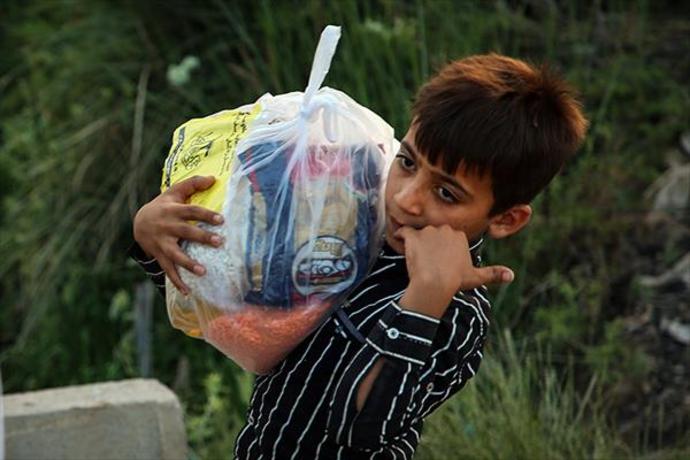 کمک&zwnj;رسانی کاروان مقاومت اسلامی نُجَباء عراق به سیل&zwnj;زدگان اهواز +تصاویر